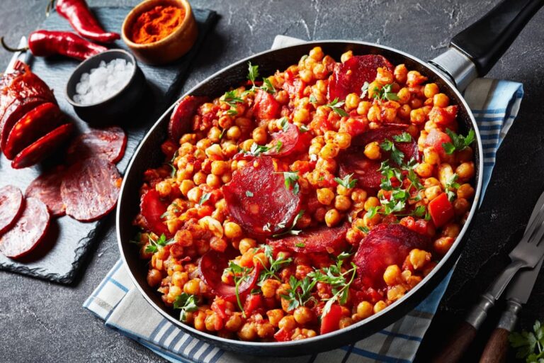 Sausage with chickpeas and bell peppers recipe image